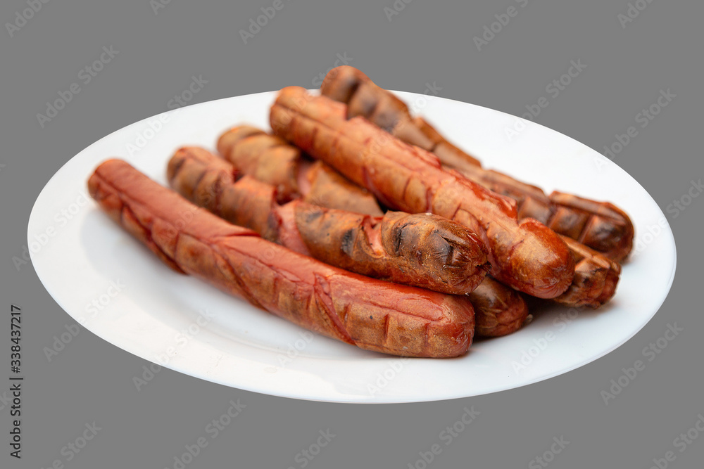 grilled beautiful delicious sausages on a white plate with no background for your design or menu grilled beautiful delicious sausages on a white plate with no background for your design or menu