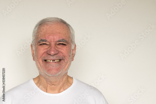 Fotografie, Obraz not in focus old man senior face closeup missing tooth smile proper tooth overex