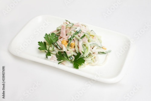 salad corn ham cucumber white background