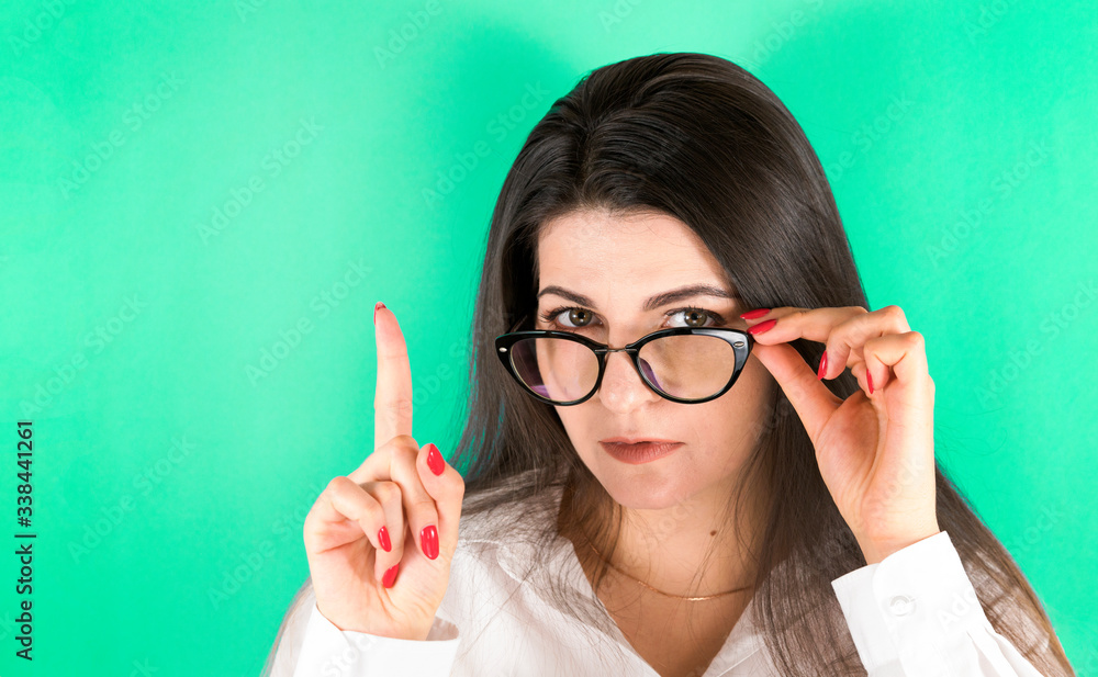 Business lady wearing black glasses posing having idea. Business lady wearing black glasses posing having idea.