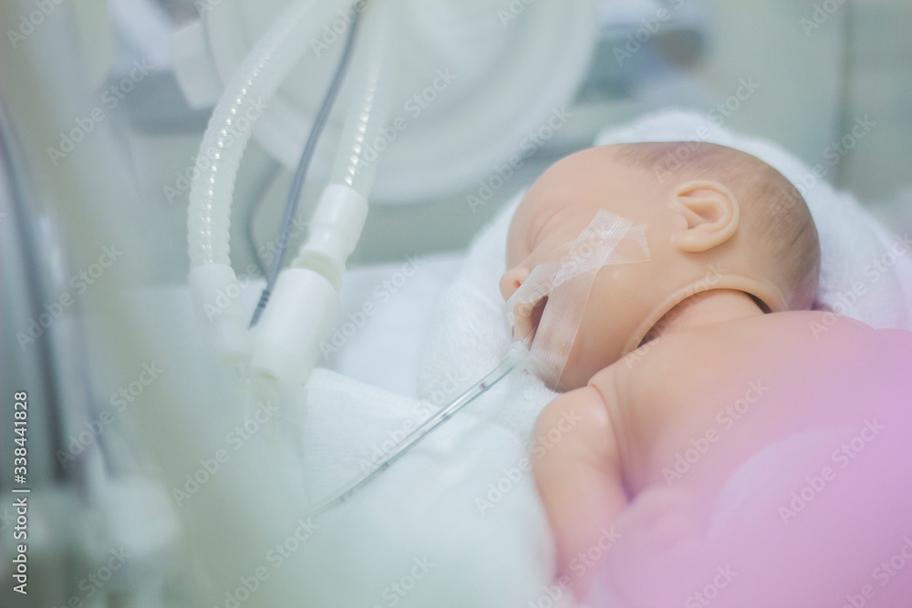 Naklejka premium Model newborn in the hospital. Pediatric Department