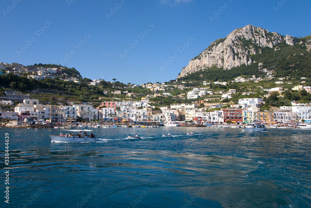 Marina Grande Harbor in the City of Capri, an Italian island off the Sorrentine Peninsula on the south side of Gulf of Naples, in the region of Campania, Province of Naples, Italy, Europe