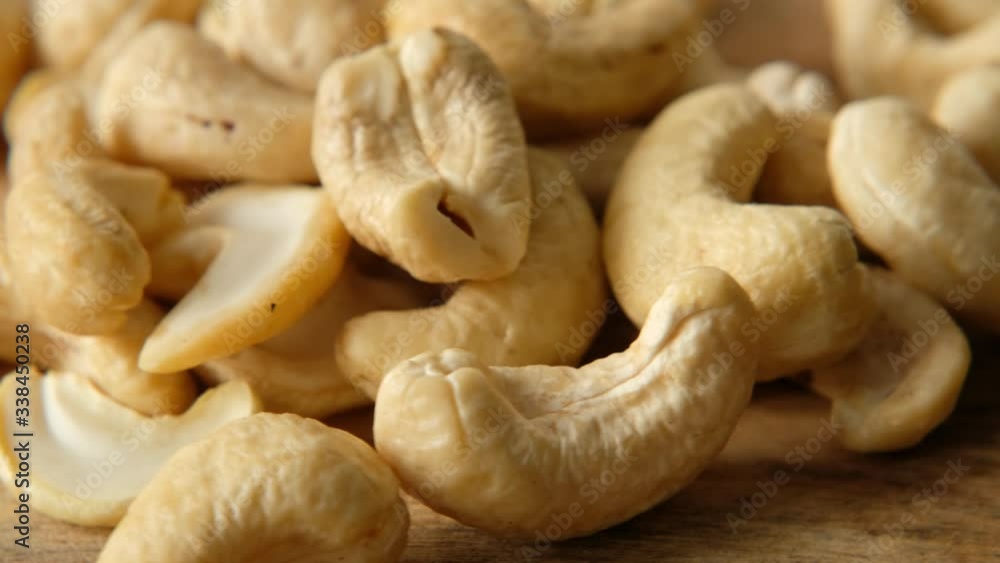 Cashew nuts rotating, macro shot. Top view Cashew nuts rotating, macro shot. Top view