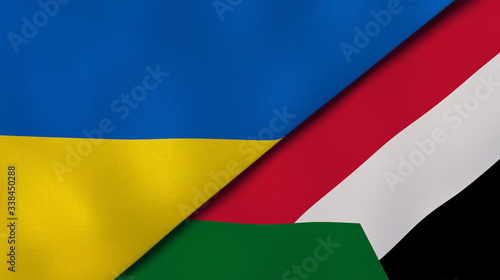 The flags of Ukraine and Sudan. News  reportage  business background. 3d illustration