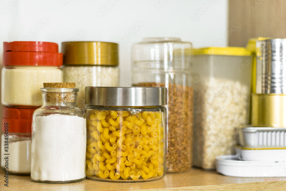 pasta, flour and cereals in glass jars on a shelf pasta, flour and cereals in glass jars on a shelf