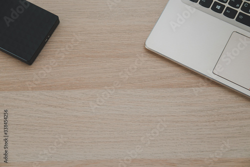 laptop on wooden table
