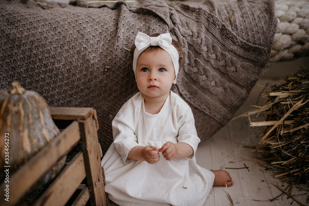 baby in white dress Stock Photo | Adobe Stock