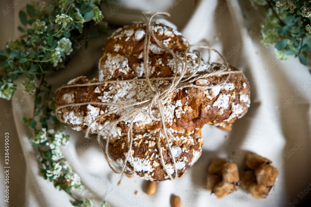 Fototapeta premium Traditional italian easter dove bread cake The counterpart of the two well-known Italian Christmas desserts, panettone and pandoro. Colomba easter