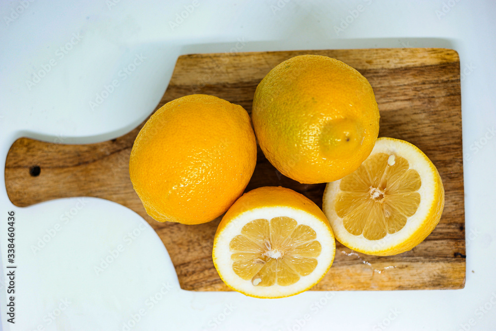 Lemons on the cutting board Lemons on the cutting board