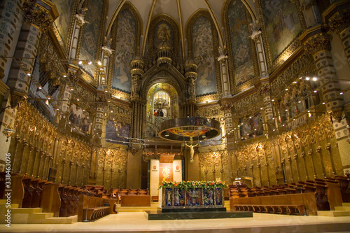 Cathedral with view in background of Black Madonna at the Benedictine Abbey at Montserrat  Santa Maria de Montserrat  near Barcelona  Catalonia  Spain where some feel the Holy Grail had been