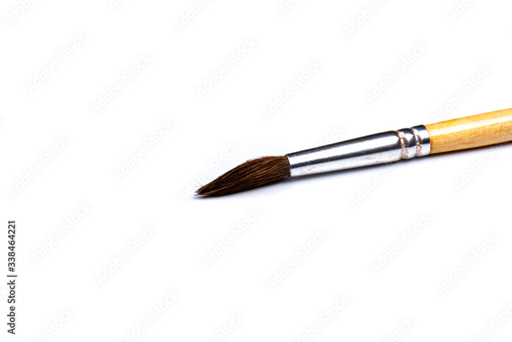 round artistic paint brush isolated on white background. space for text round artistic paint brush isolated on white background. space for text