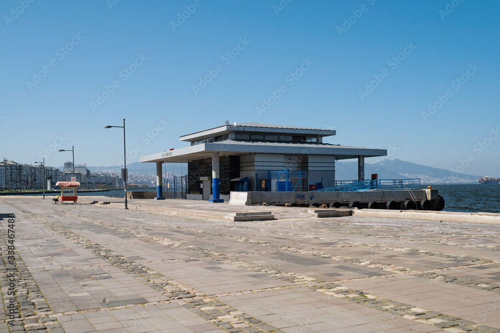 Alsancak steam boat pier is shut and with nobody outside and no travellers.