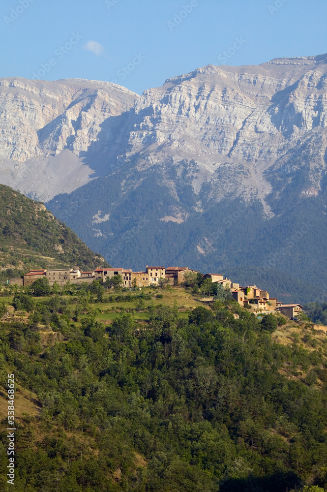Mountain village with Pyrenees Mountains in background near La Seu d'Urgell, Cataluna, Spain, Europe