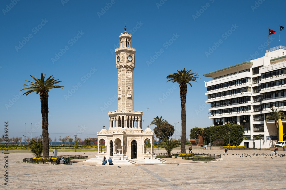 Clock tower of Izmir Turkey. Empty streets because of Coronavirus pandemi. People of is izmir is staying home.