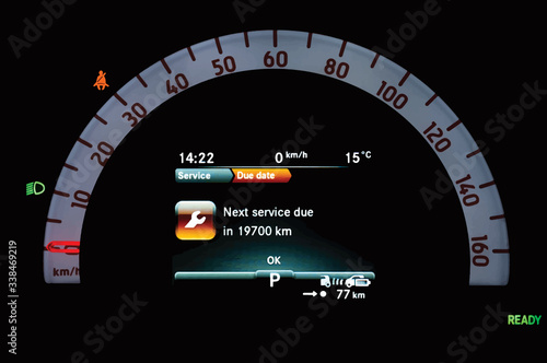 Illustration of car dashboard panel with display indicates when service is needed. Mileage counter for service inspection in full electric vehicle. Cluster with car inspection reminder and speedometer