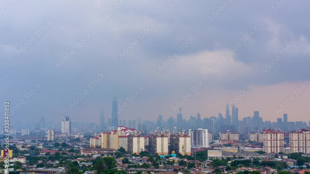 4K time lapse of monsoon clouds over down town Kuala Lumpur, Malaysia. Zoom In 4K time lapse of monsoon clouds over down town Kuala Lumpur, Malaysia. Zoom In