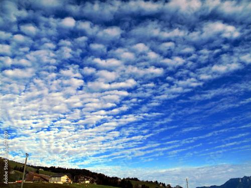 cumulus skyscape over wildhaus, gulmen, swiss alps