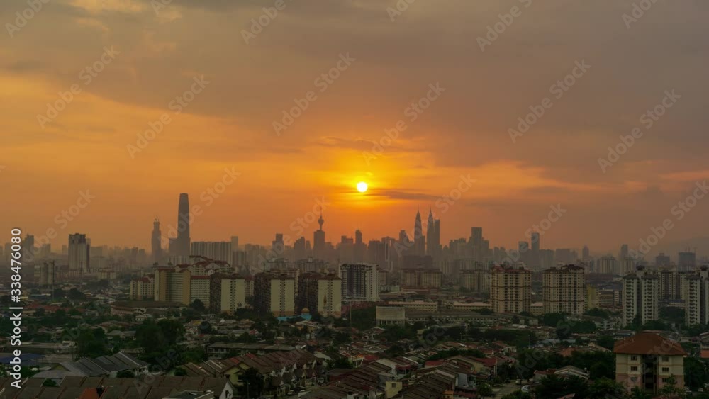 4K Time lapse of cloudy sunset over down town Kuala Lumpur, Malaysia. 