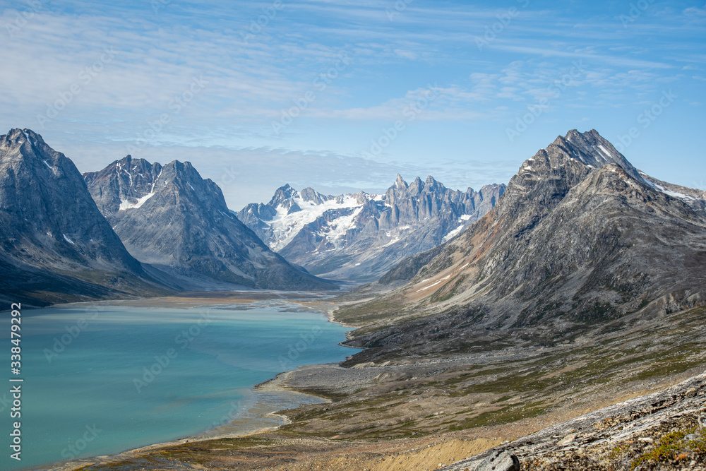 Amazing wide shot of mountains at the end of a Greenlandic fjord