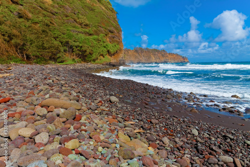 Multicolored Rocks Covering The Beach at Pololu Valley, Hawaii, Hawaii, USA photo