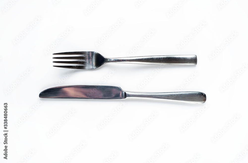knife and fork on a white background knife and fork on a white background