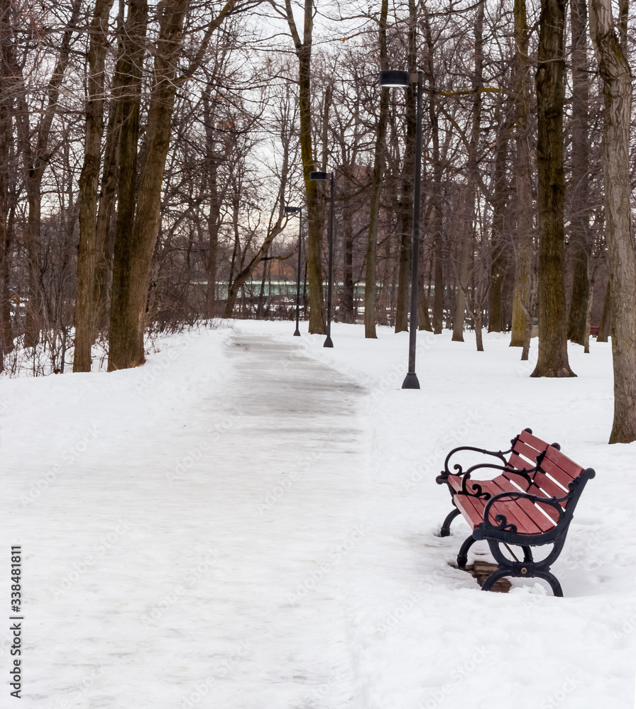 Empty Park Bench in the Snow, Goat Island,Niagara Falls, New York,USA