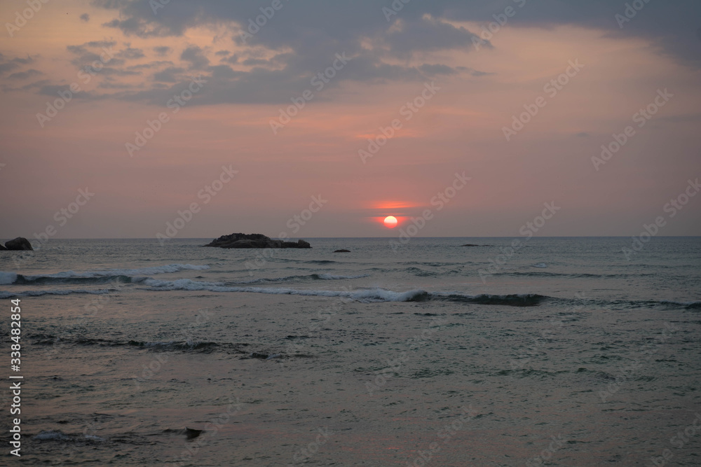 sunset on the indian ocean in sri lanka
