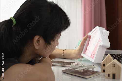 Woman looking at the clock,...