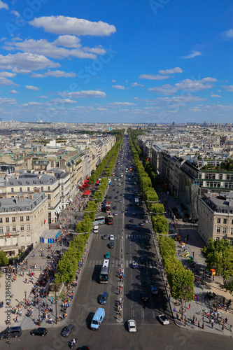 PARIS, FRANCE, EUROPE -Aerial view of Paris, France as seen from the Arch of Triumph on a sunny day with white puffy clouds, shot August 4, 2015