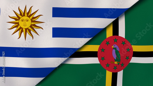 The flags of Uruguay and Dominica. News, reportage, business background. 3d illustration photo