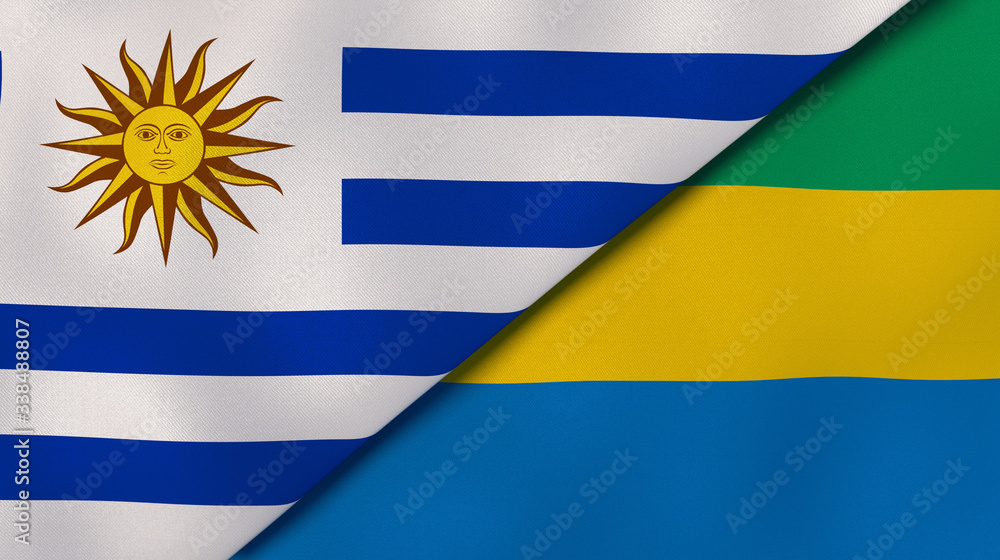 Fototapeta premium The flags of Uruguay and Gabon. News, reportage, business background. 3d illustration