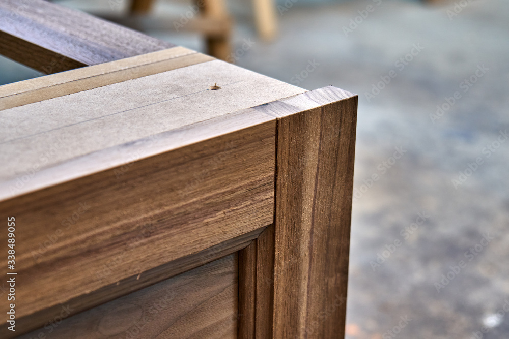 Dresser elements in a workshop. Solid wood chest of drawers. Furniture manufacture