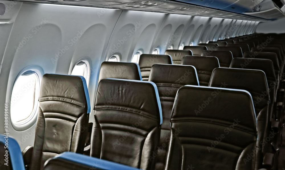 Fototapeta premium empty cabin passanger plane seats