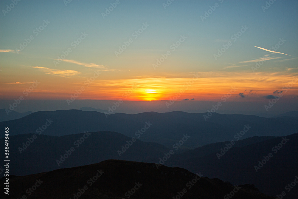 Fototapeta premium Orange sunset in the Polish mountains