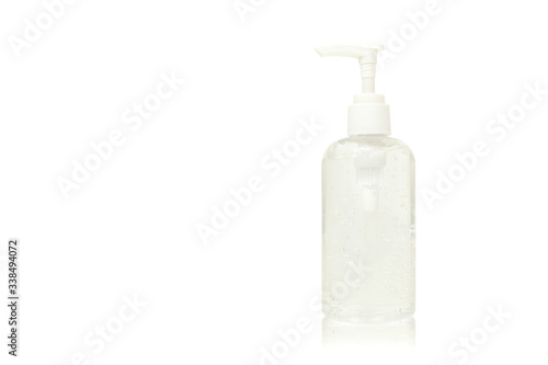 Clear hand sanitizer in a clear pump bottle with copy-space a white background.Coronavirus concept
