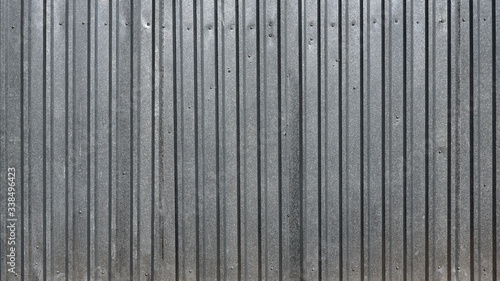 Gray metal decking. Sheets of gray corrugated iron