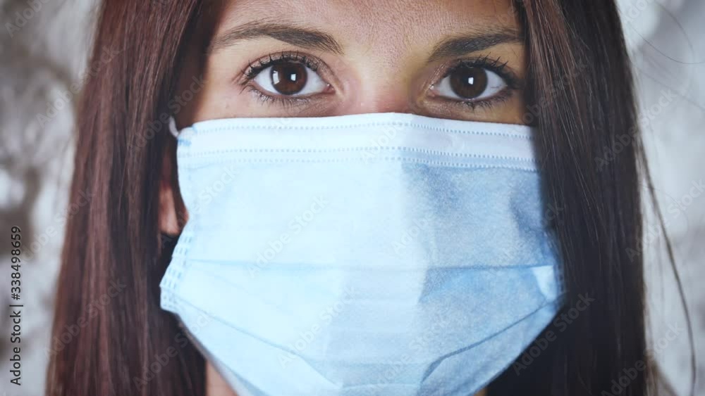 woman portrait close up with surgical mask. Concept of prevention of Coronavirus virus Covid 19. Medical dispositive protective for hospitals, dentists woman portrait close up with surgical mask. Concept of prevention of Coronavirus virus Covid 19. Medical dispositive protective for hospitals, dentists