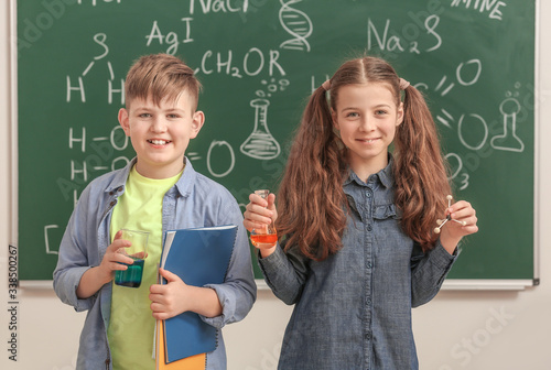 Cute little children near b...