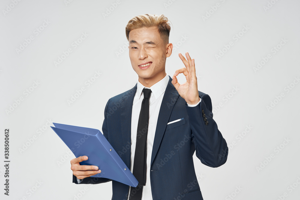 young businessman with a folder young businessman with a folder