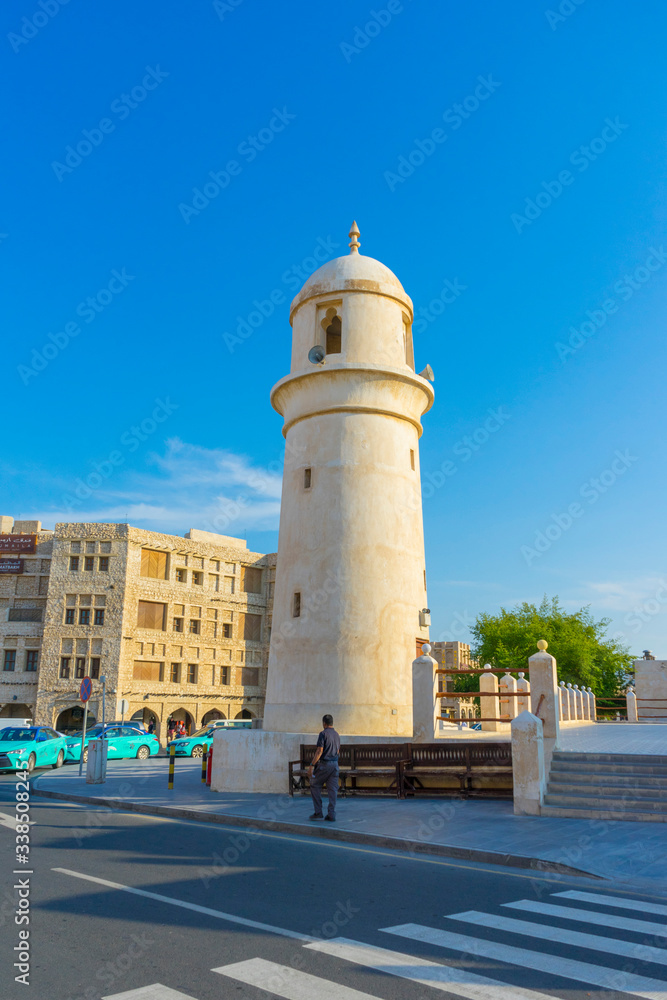Al Ahmad Mosque, ancient mosque with its minaret in the heart of Souq Waqif, old traditional market in Doha, Qatar 