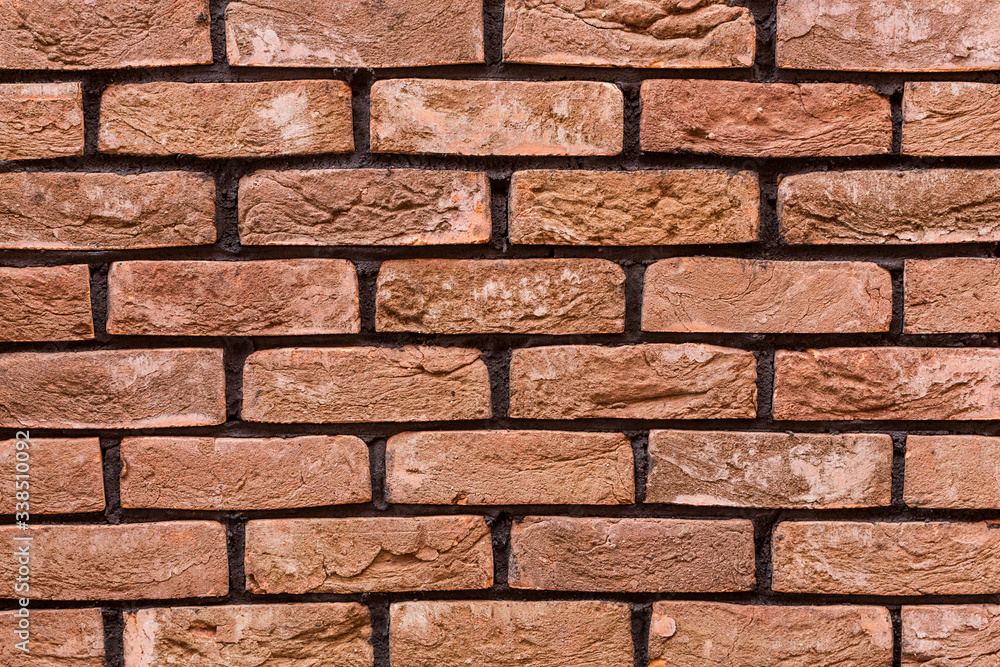 Handmade bricks on a white background. A rock. Construction. The wall is made of bricks. Handmade bricks on a white background. A rock. Construction. The wall is made of bricks.