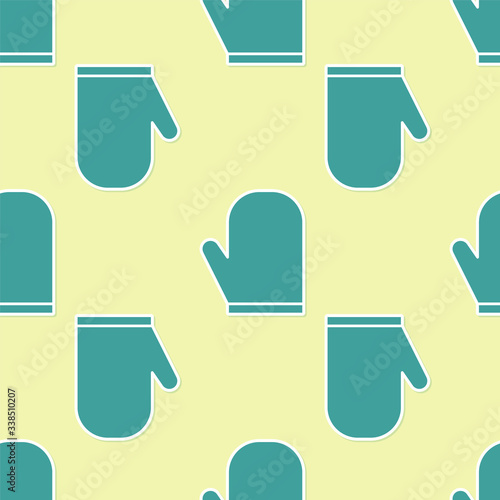 Green Oven glove icon isolated seamless pattern on yellow background. Kitchen potholder sign. Cooking glove.  Vector Illustration