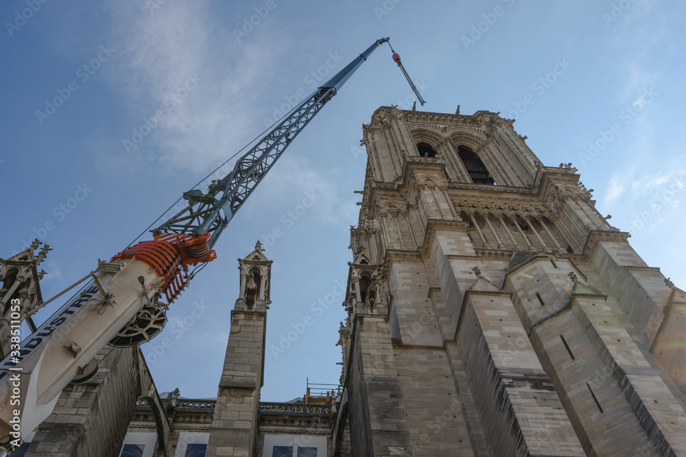 Obraz premium Notre Dame de Paris after fire. Reconstruction work in progress after the fire, to prevent the Cathedral Notre Dame de Paris to collapse.