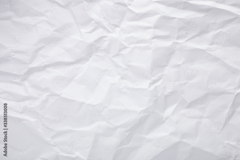 Obraz premium White crumpled paper texture as background. Copy space text