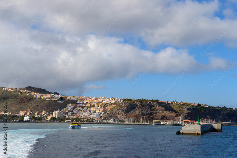 Magnificent Views From The Sea With The Wake Of The Ferry And As Background The Island Of La Gomera. April 15, 2019. La Gomera, Santa Cruz de Tenerife Spain Africa. Travel Tourism Photography Nature.