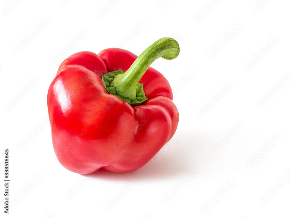Bright red bell pepper with a shiny skin on a white background Bright red bell pepper with a shiny skin on a white background