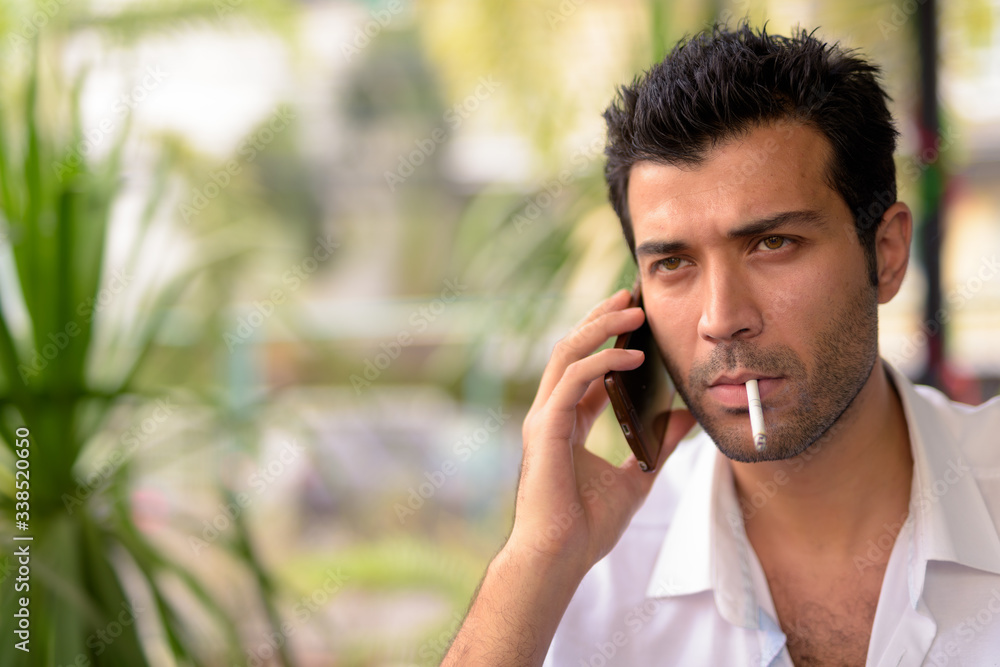 Face of handsome Turkish man at the coffee shop Face of handsome Turkish man at the coffee shop