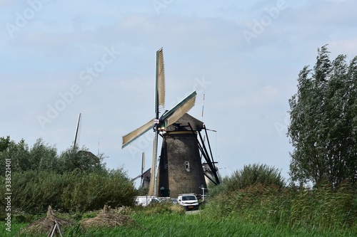 Windmill at Kinderdijk.
Kinderdijk is a village in the municipality of Molenlanden, in the province of South Holland, Netherlands. photo