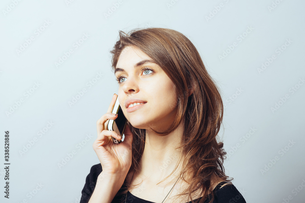 funny cute brunette girl talking on a cell phone funny cute brunette girl talking on a cell phone