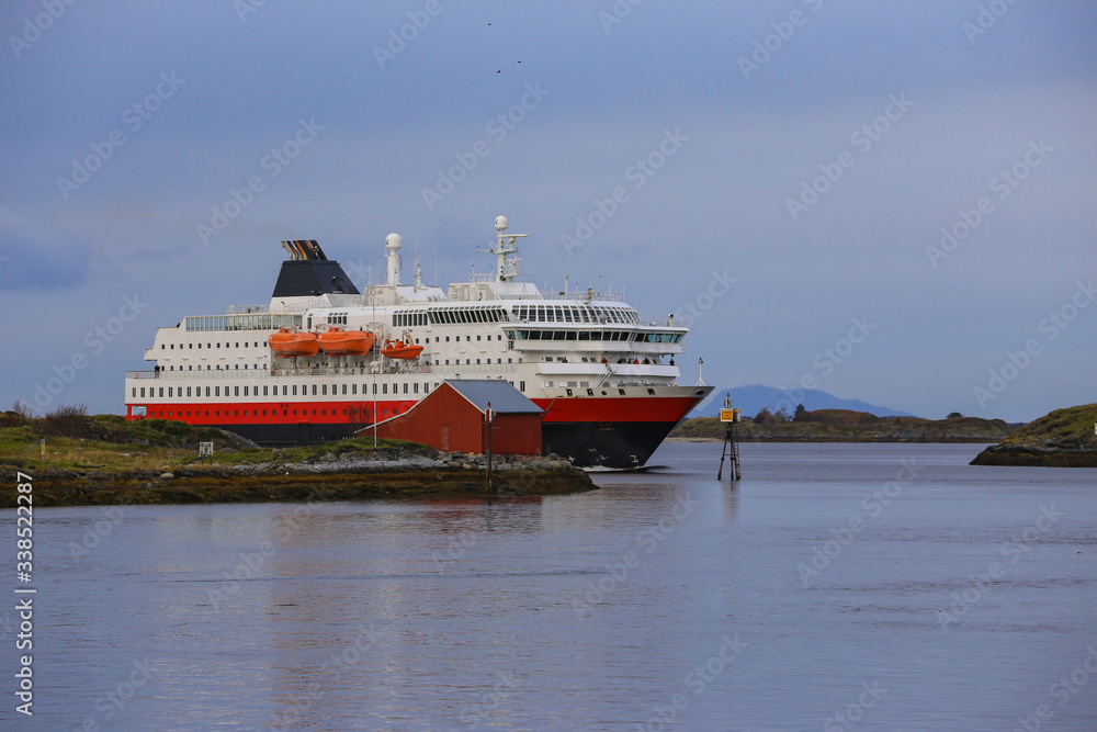 Coastal passenger ships arrive at Brønnøysund harbor in Nordland county